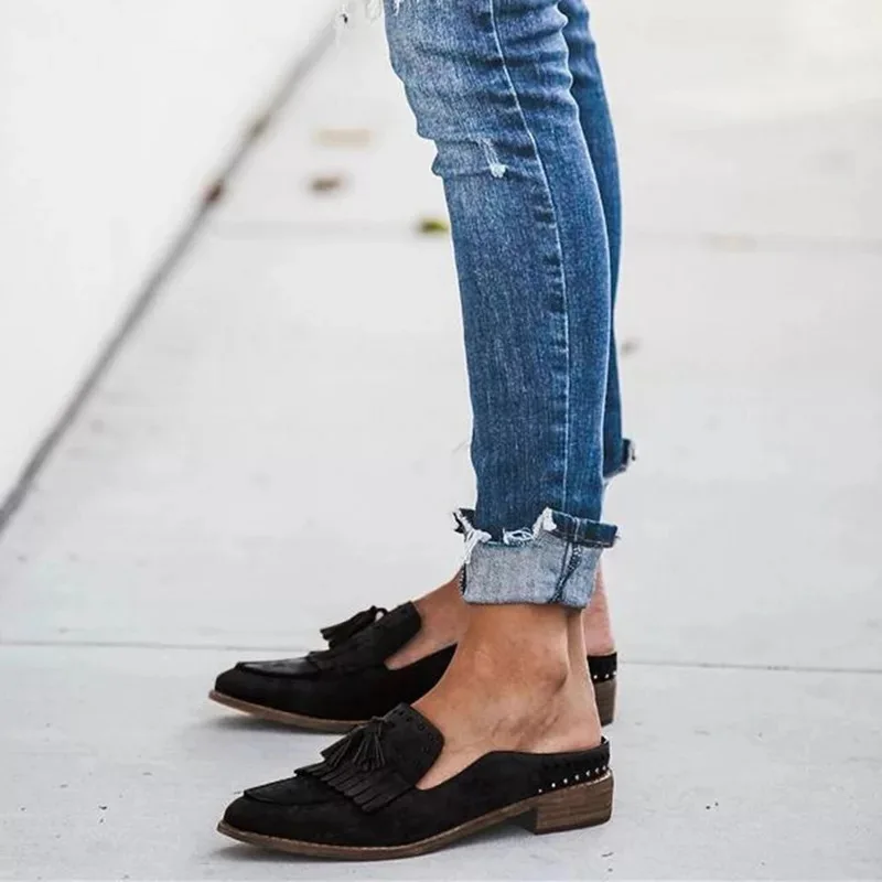 Printemps à semelles plates décontracté à talons bas chaussures pour femmes à la mode Style Harajuku gland Mules en cuir véritable sandales confortables