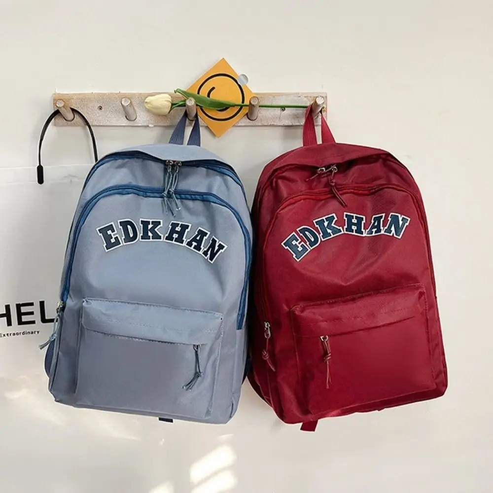 Mochilas escolares de Color sólido para estudiantes, bolsa de hombro impermeable con cremallera Simple de gran capacidad