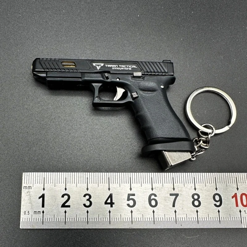 Image of 1:3 Halbmetallisches Zerlegbares G34 Pistolen-Modell Mini-Spielzeugpistole Schlüsselanhänger Taschenanhänger Bastelset für Kinder und Erwachsene