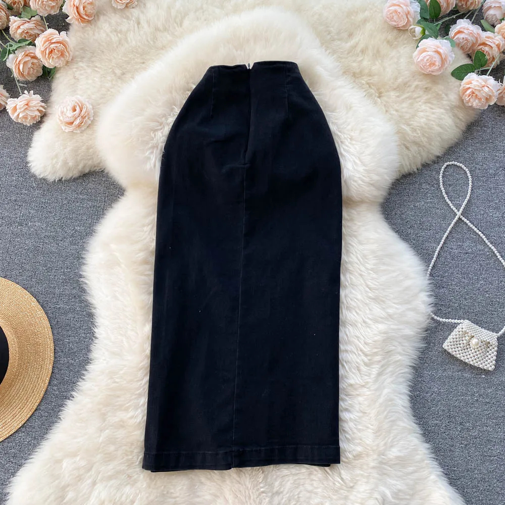 Primavera/Estate 2025 Nuovo senso del design monopetto diviso dimagrante vita alta gonna di nicchia di media lunghezza gonna nera
