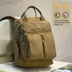 Mochilas de gran capacidad para mujer, mochila informal impermeable, mochila de viaje ligera, mochila escolar de nailon de Color sólido con múltiples bolsillos