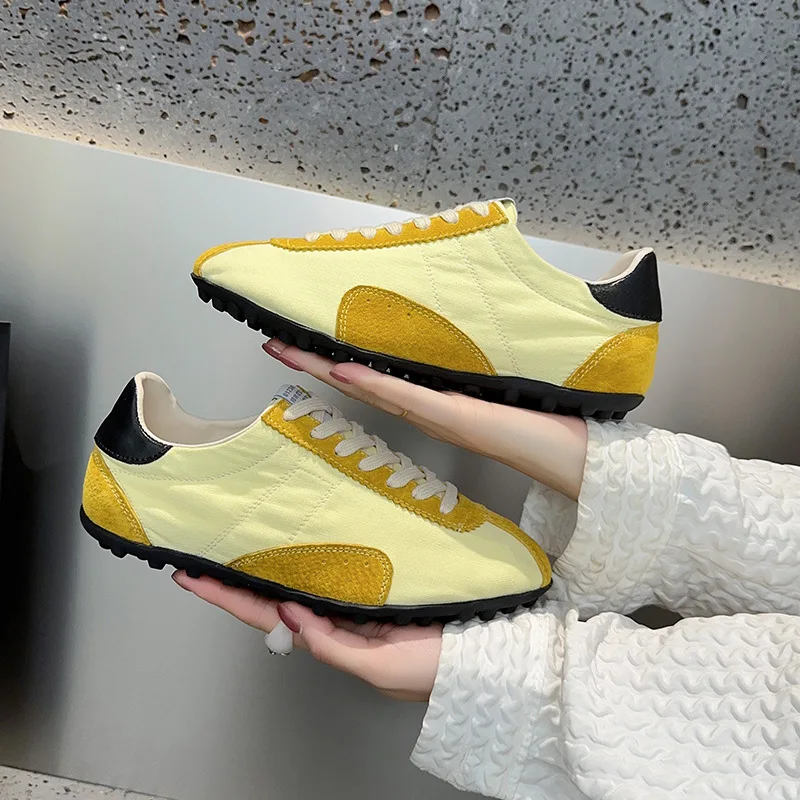 Flat bottomed lace up versatile casual fashion niche color blocking retro sports running shoes for women