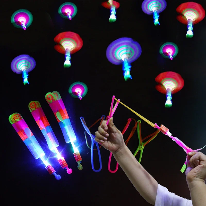 Increíble juguete ligero con forma de flecha, juguetes con luz LED para fiesta al aire libre, regalo divertido, banda de goma, catapulta que brilla en la oscuridad, helicóptero con cohete, juguete volador