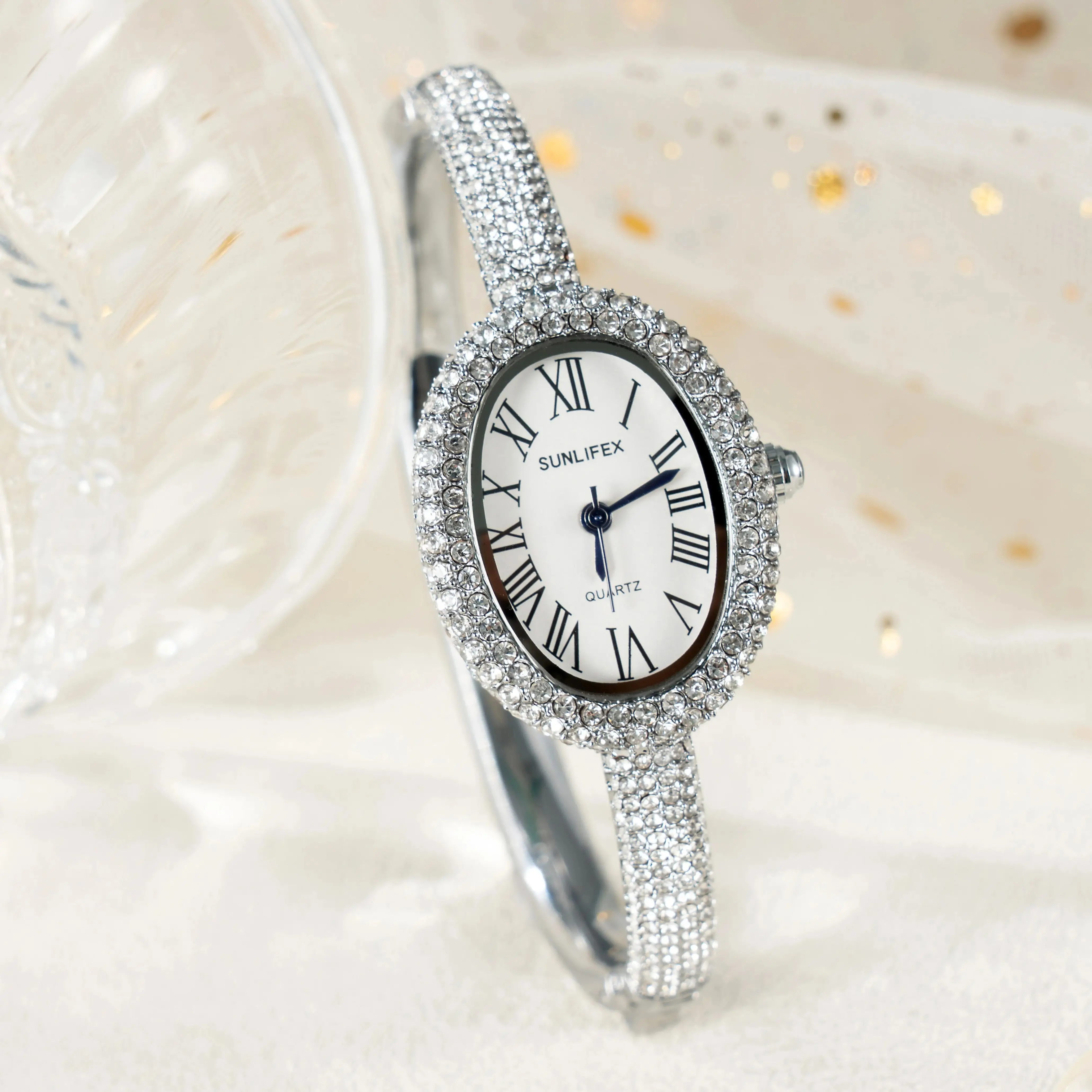 

Изысканные женские часы с инкрустацией драгоценными камнями, овальный циферблат, водонепроницаемые роскошные кварцевые часы, женские повседневные наручные часы