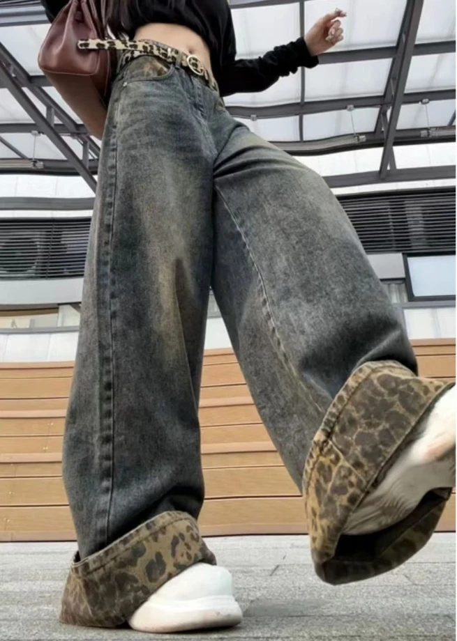 Jeans patchwork con design di nicchia con orlo arrotolato con stampa leopardata americana per le donne Nuovi pantaloni lunghi versatili a gamba larga Pantaloni a campana Moda