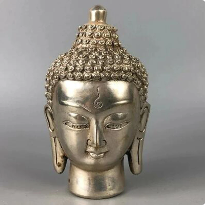 

Chinese Antique Rare Collectible Old Tibet Silver Handwork Buddha Head Statue