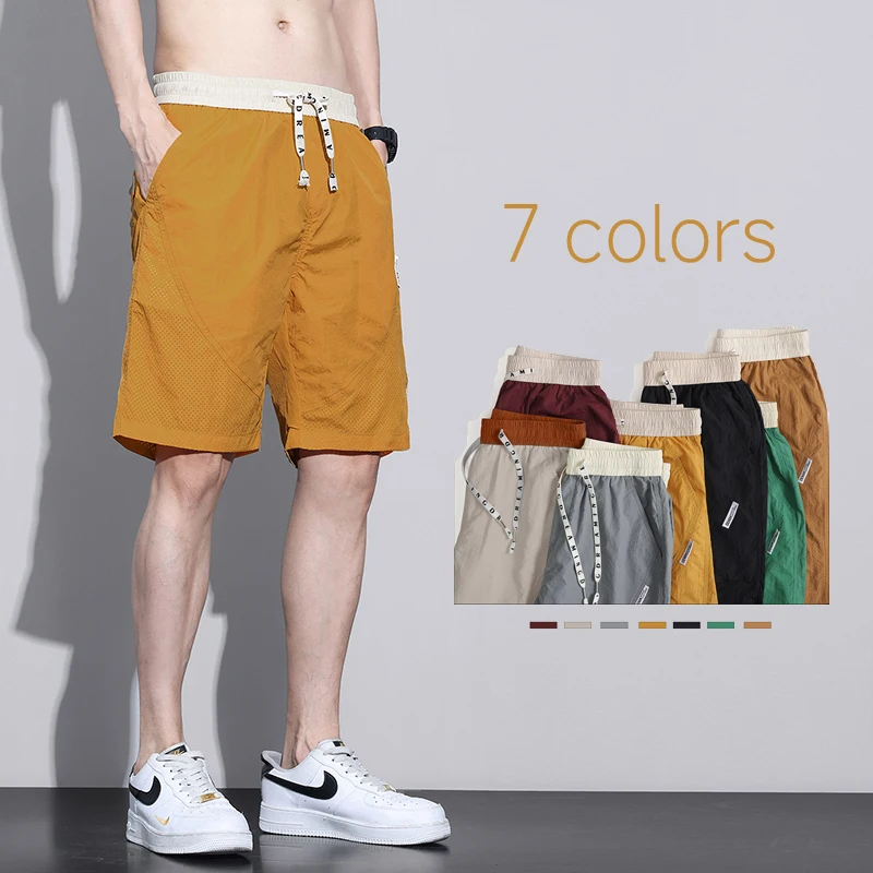 

2026 New Summer Thin Breathable Mesh Men's Shorts Elastic Waist Loose Vacation Sporty Mid Length Casua Beach Pants 7 Color