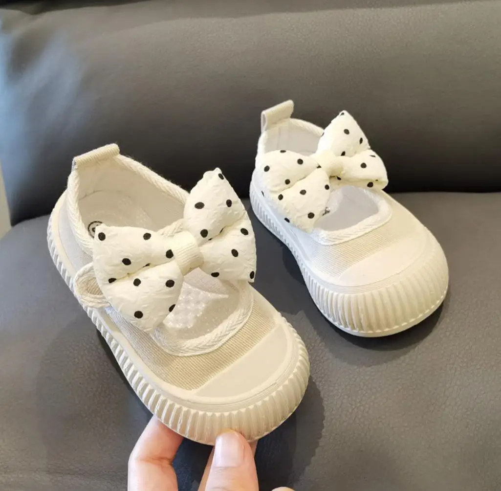 Zapatos de lona con lazo de lunares para bebés y niños pequeños, zapatillas planas de princesa de suela suave, diseño de boca cuadrada