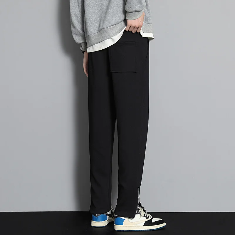 ملابس رياضية برباط بخصر مطاطي للرجال ربيع الخريف بنطلون رياضي متين بنطال واسع الساق مستقيم للرجال بناطيل عصرية فضفاضة غير رسمية