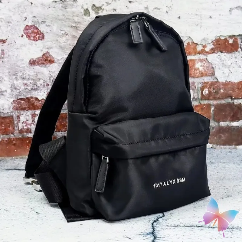 Black 1017 ALYX 9SM Backpacks Fashion Street Men Women Casual Outdoor Travel Metal Socket Letter Logo Zipper Opening Nylon Bags
