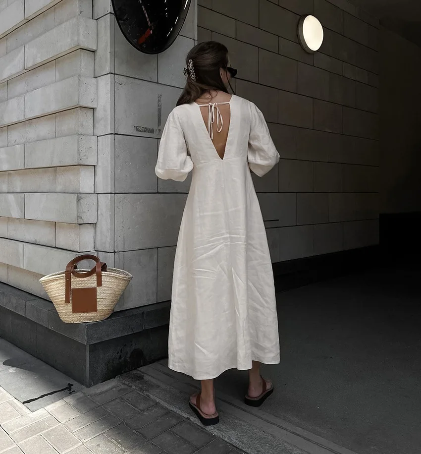 Cotton dress with wide neckline on the lower back, beige V neck with beige neckline on the belt