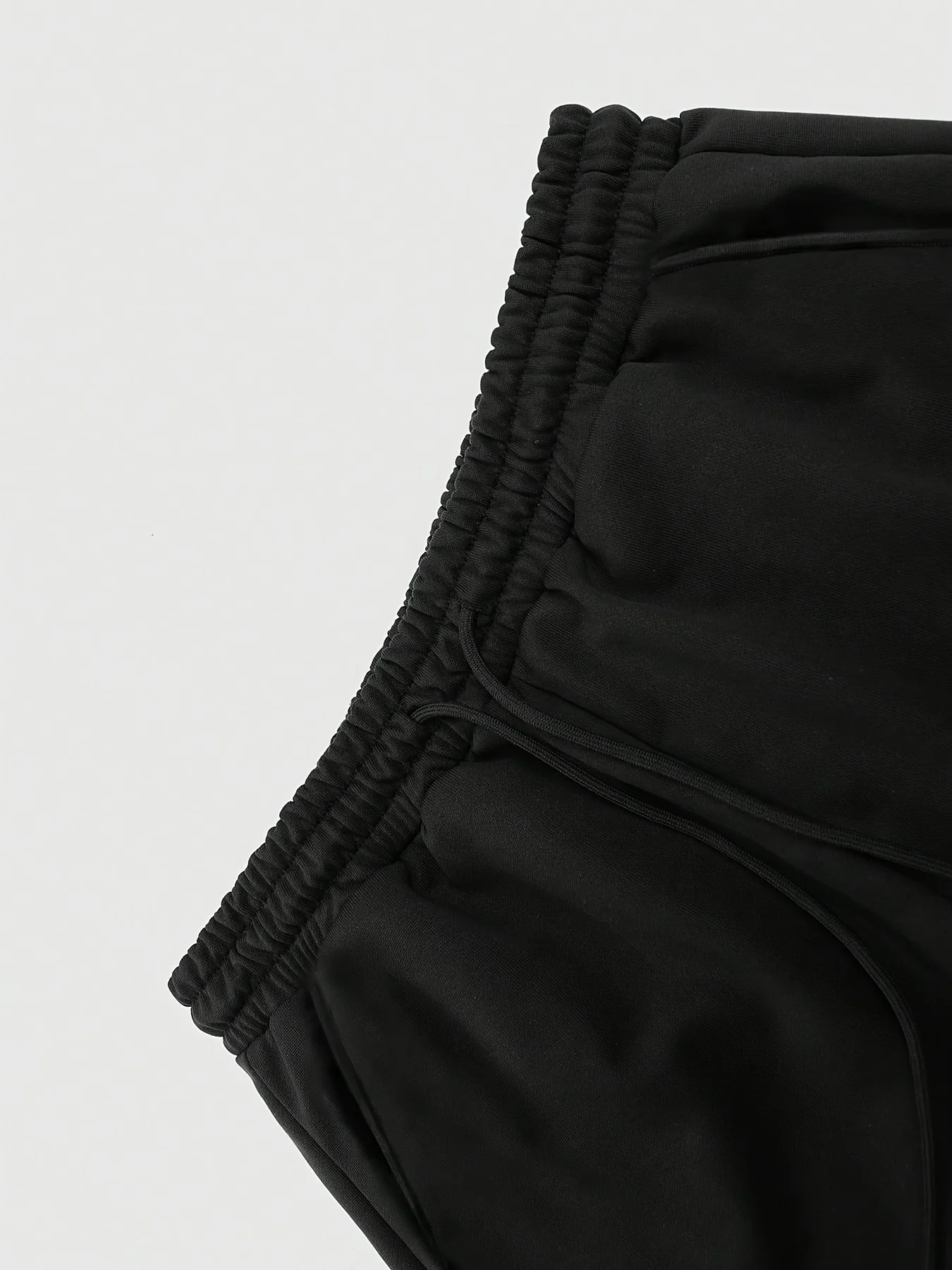 Men's athletic pants featuring the unique "FAITH OVER FEAR" slogan and a graphic print combining a crown of thorns with a cross. view 5