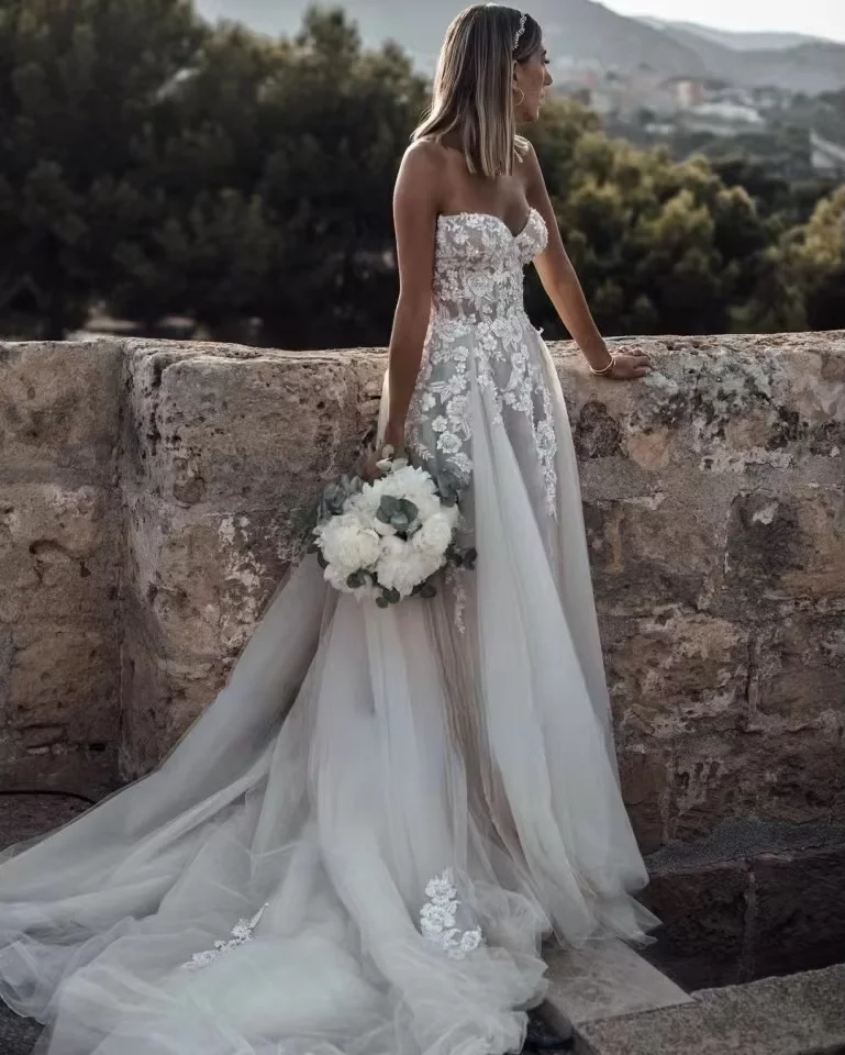 2024 BOHO Breathtaking Strapless Wedding Dress Featuring Stunning Lace Appliques and Flowy A-Line Bridal Dress Customized