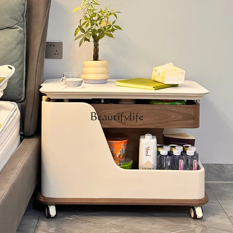 

Several movable multi-function lifting trolley with wheels on the side of the sofa