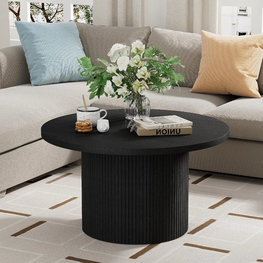 Round coffee table for living room use, solid wood construction, black finish, spacious 35.4-inch diameter surface
