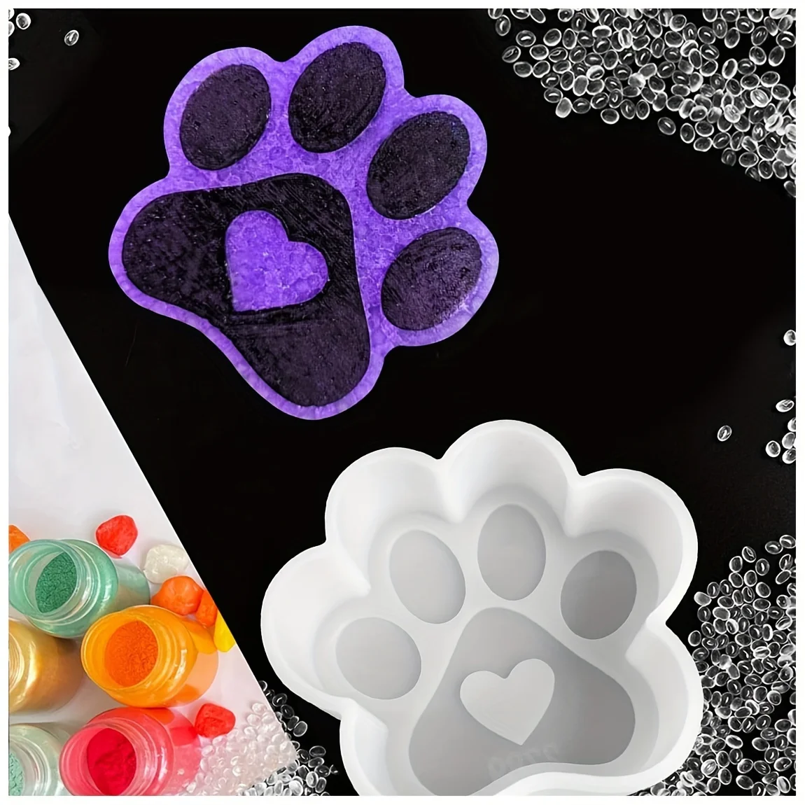 Silicone mold in the shape of a heart-shaped cat paw with holes, designed for making scented stones, scented beads, soap