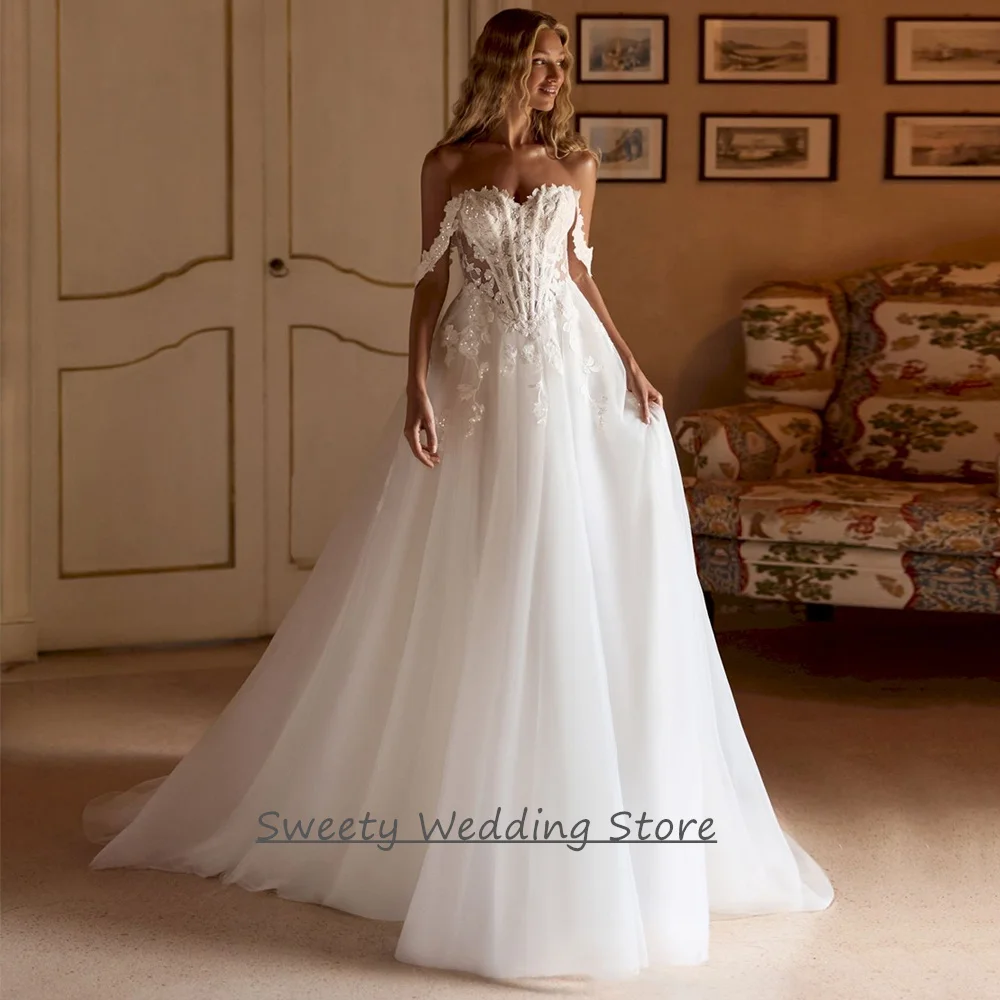 

2026 Wedding Dress Customized Off The Shoulder Sweetheart See Through Sequined Applique Sweep Train Backless Bride Gown