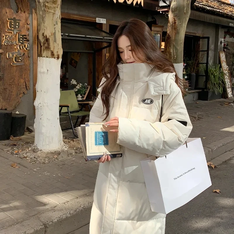 2025 New Korean Version Long Cotton Jacket For Female Students Knee Length Winter Fashionable Loose Down Cotton Jacket Beige