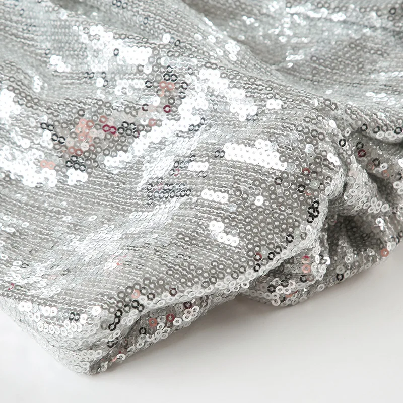 Falda corta de cintura baja para escenario, ropa Sexy, diseño europeo, falda de burbuja reflectante con lentejuelas