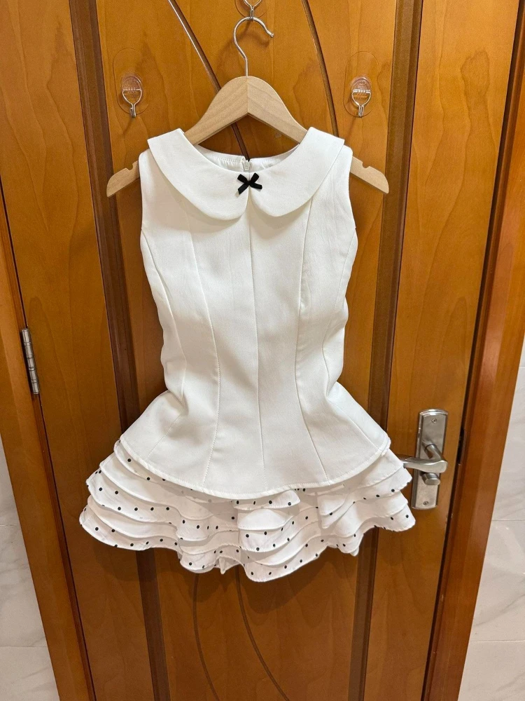

Korean Vintage Sleeveless Cami Top Lace-Up + Mini Skirt Polka Dot Fluffy Two-Piece Set Women Sweet Bodycon Doll Collar 2026