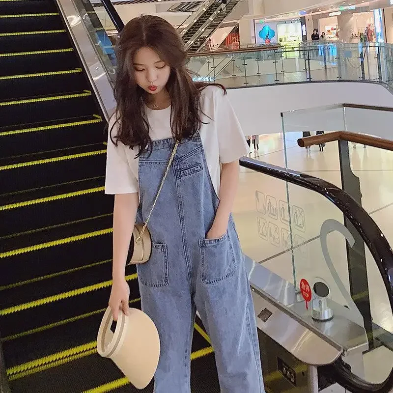 Tute da donna Salopette blu lavata in denim stile coreano Pantaloni larghi casual Pagliaccetti da donna con tasca Vintage Spring Chic femminile