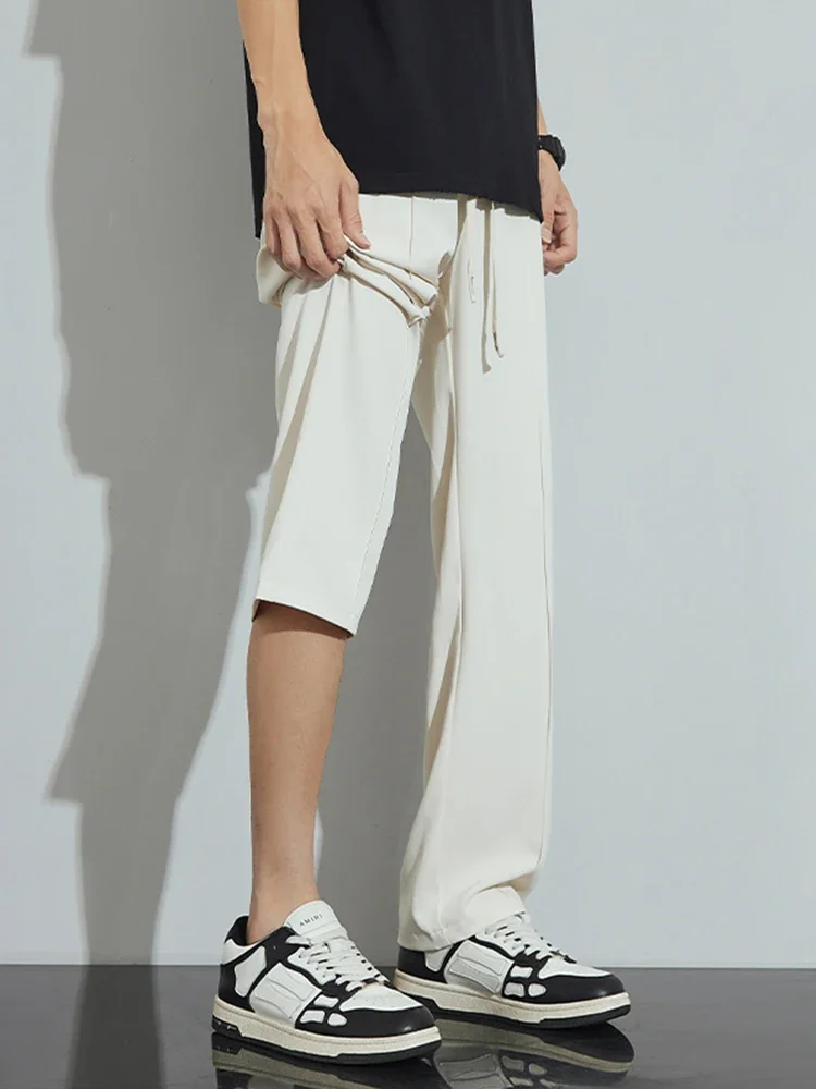Pantaloni Casual a gamba larga da uomo sottili in seta di ghiaccio vestiti estivi pantaloni dritti alla moda pantaloni sportivi maschili traspiranti