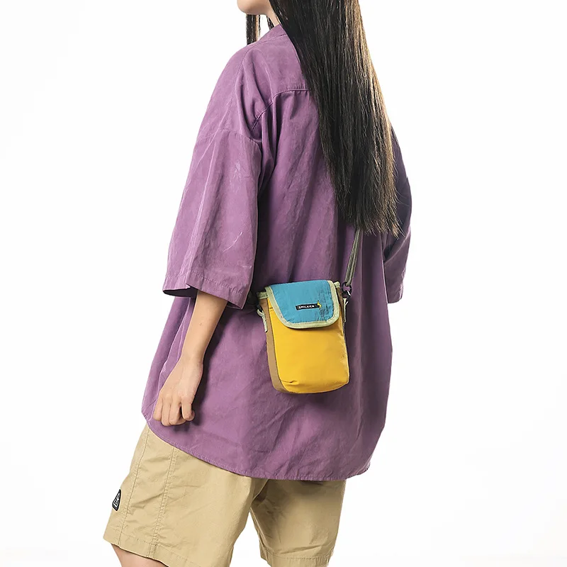 2025 New Retro Outdoor Color Contrasting Lightweight Mobile Bag for Travel Dopamine Women's Bag Trendy and Convenient Small Bag
