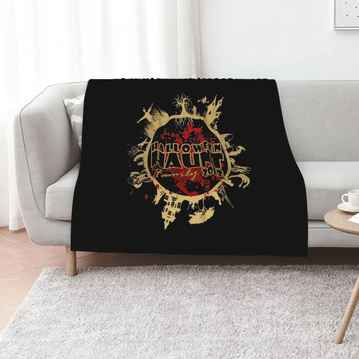 This Halloween Haunt Family 2022 design is available exclusively for members of the official Halloween Haunt Famil Throw Blanket