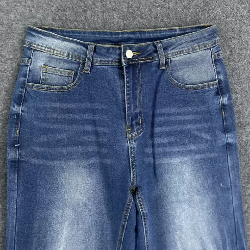 Amerykańskie trendy streetwear retro minimalistyczne jeansy damskie jesienne średni stan luźne spodnie z szerokimi nogawkami prostym krojem długie spodnie