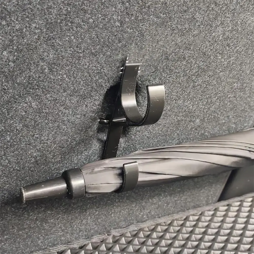 Gancho para paraguas de coche, sin instalación de taladro, fija de forma segura para maletero de asiento de coche, previene el accesorio rodante del paraguas, 1 Uds.