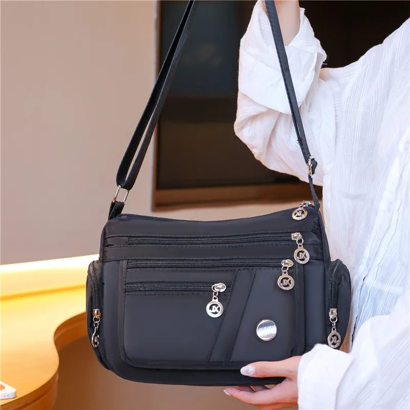 Große Kapazität Frauen Umhängetasche wasserdichte Tasche lässig Nylon Umhängetasche Geldbörse Handtasche leichte Reise Umhängetasche – Detail 11