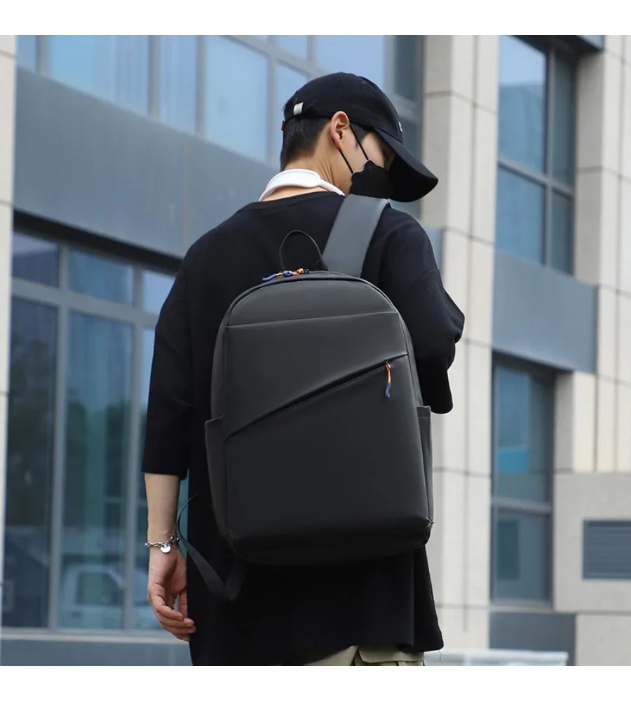 Minimalist black laptop backpack anti-splash lightweight schoolbag for students daily use and casual outings