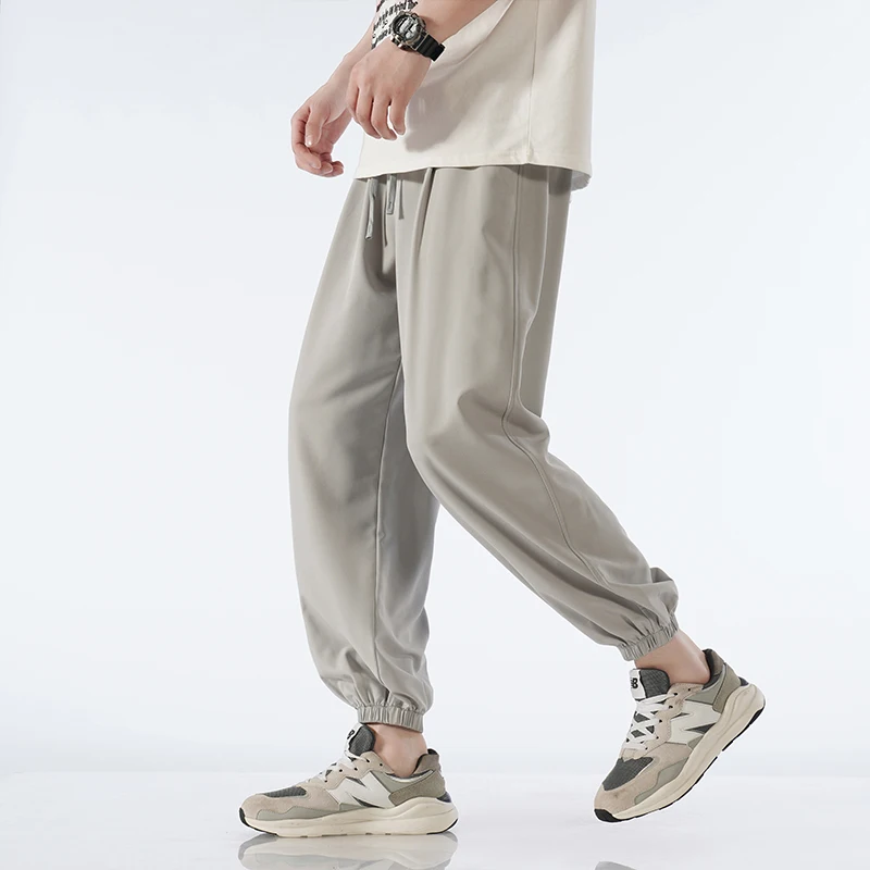 

Summer pants for men's thin and loose fitting leggings, sporty and casual cropped pants in large gray, quick drying