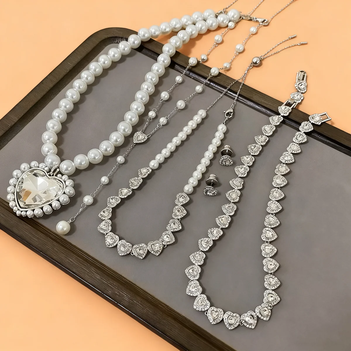 

Жемчужное ожерелье Love, женские легкие роскошные универсальные серьги, высококачественный комплект украшений-браслет