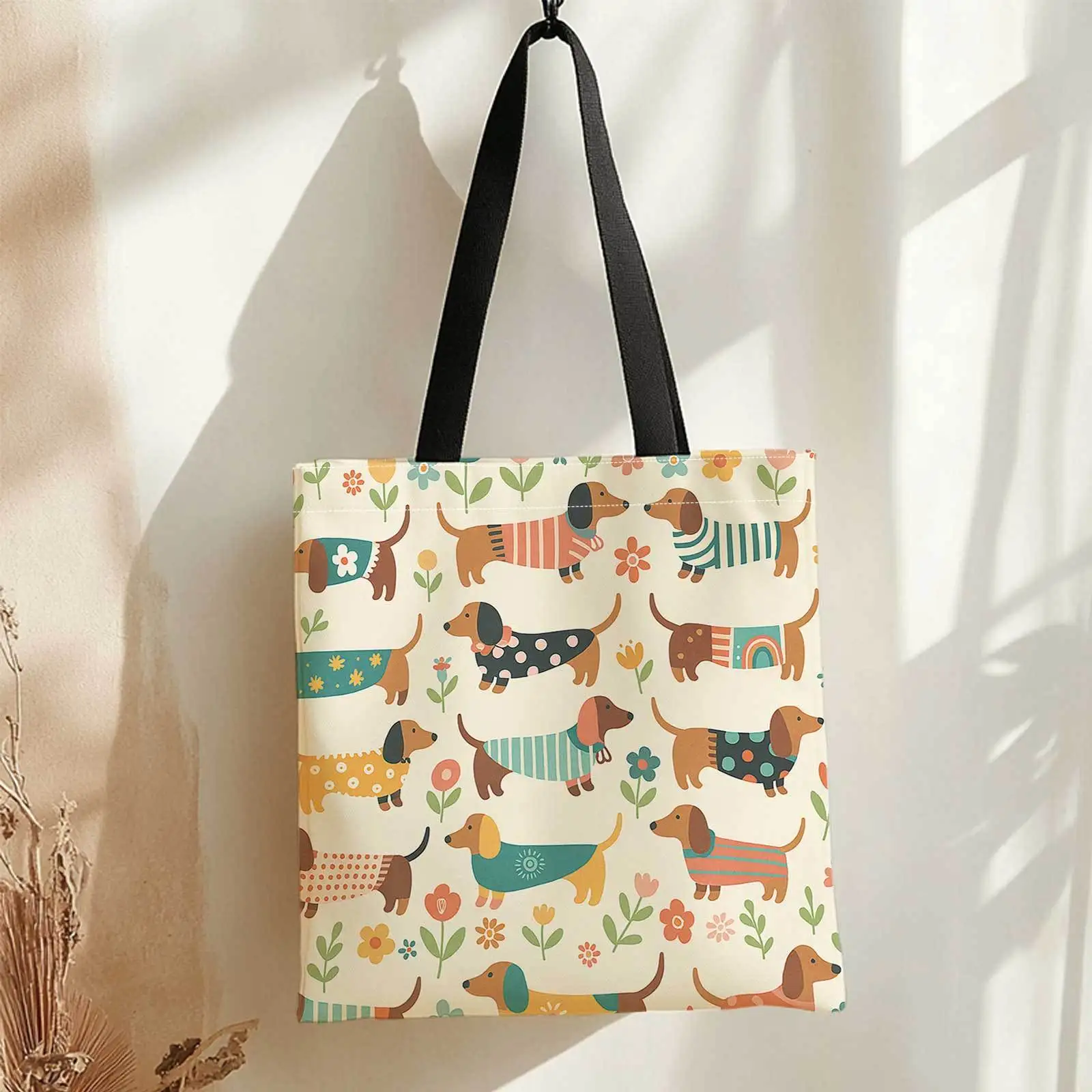 A Shopping Tote Bag with Prints on Both Sides Featuring Dachshunds, Vibrant Patterns, And a Floral Backdrop. This Lightweight, F view 3
