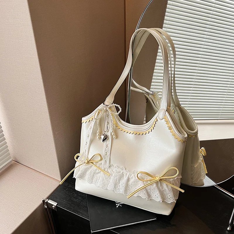 

2025 spring and summer new large-capacity tote bag high-end fashion casual all-match bow armpit bag commuter shoulder bag