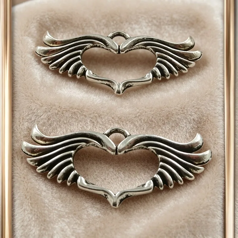 90 Stück antiksilberfarbene Flügel-Herz-Anhänger, 44 x 19 mm, für Halsketten, Ohrringe, Schmuckherstellung, A303, Großhandel – Detail 1