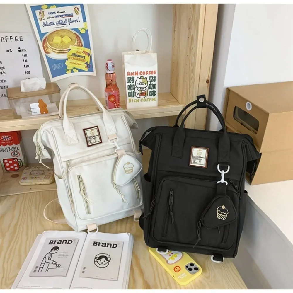 

Новый нейлоновый школьный рюкзак, износостойкая сумка для подгузников большой емкости с портмоне, набор для ноутбука, книг, студенческий