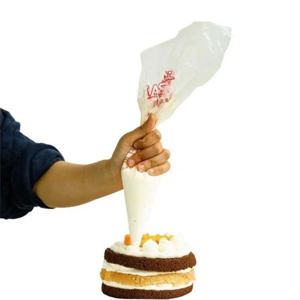 100 قطعة كيس الأنابيب القابل للتصرف الجليد فندان كعكة كريم ضغط كريم حقيبة تلميح فوهة أكياس كعكة أدوات الحلوى الديكور المعجنات