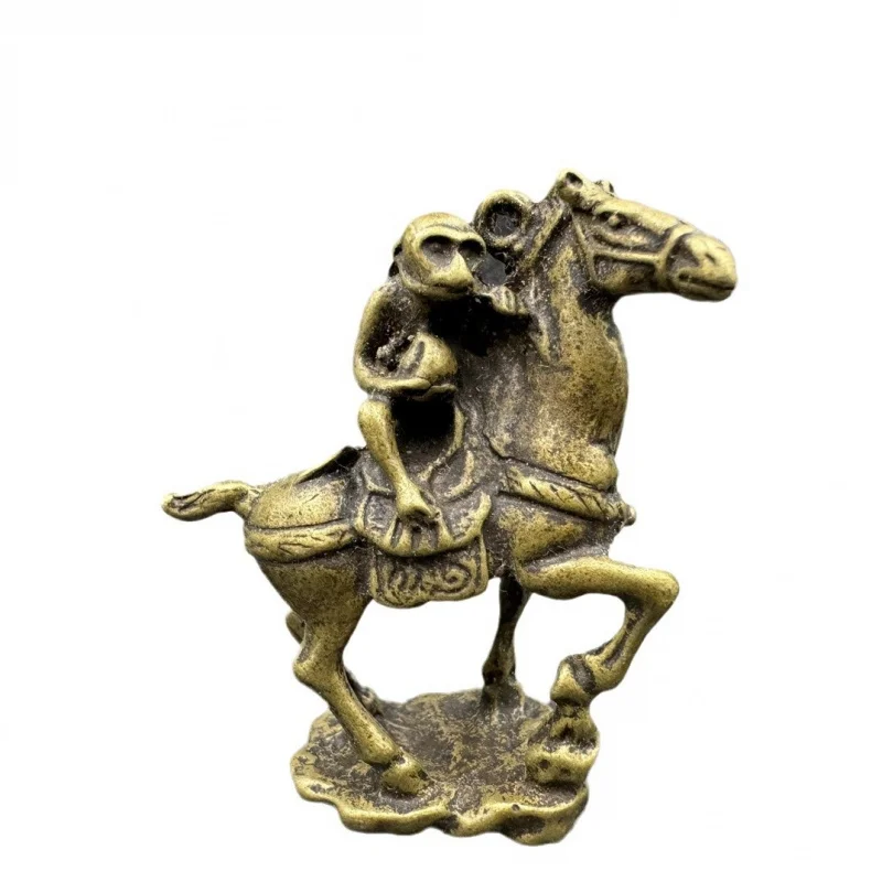 Small ornaments: standing, little , bronze monkey riding a horse, collectible items