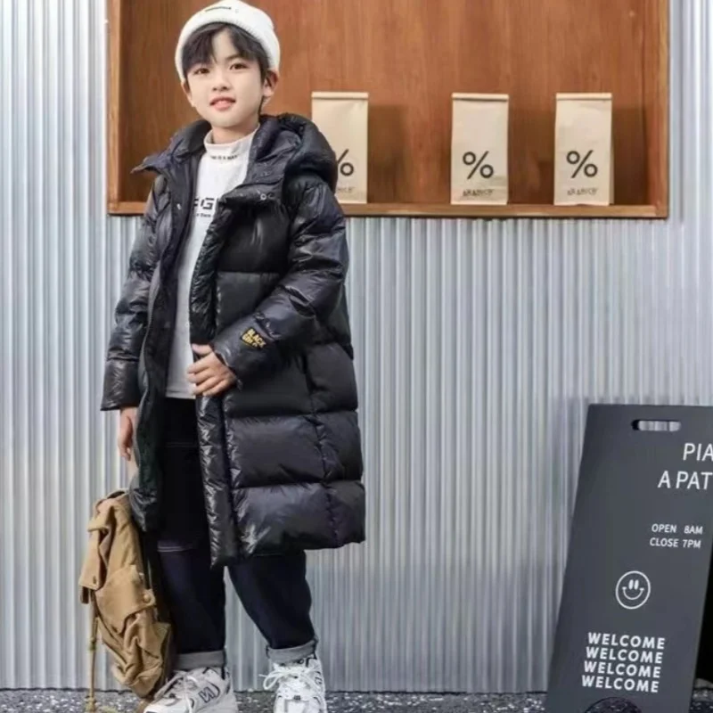 Giacca invernale per ragazze adolescenti 2025 -33 ℃   Parka lungo con cappuccio spesso impermeabile lucido per tuta da neve in cotone caldo alla moda per bambini 4-12 anni