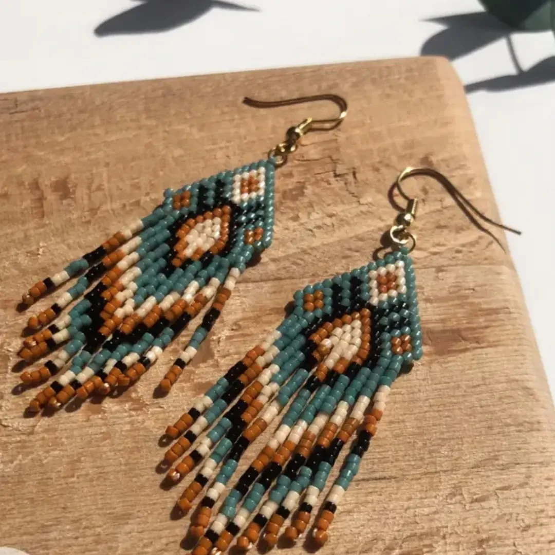 

Rice bead earrings Tassels Geometry Bohemia Pattern Hand weaving Alloy Creativity Female Fashion Simple Beaded earrings