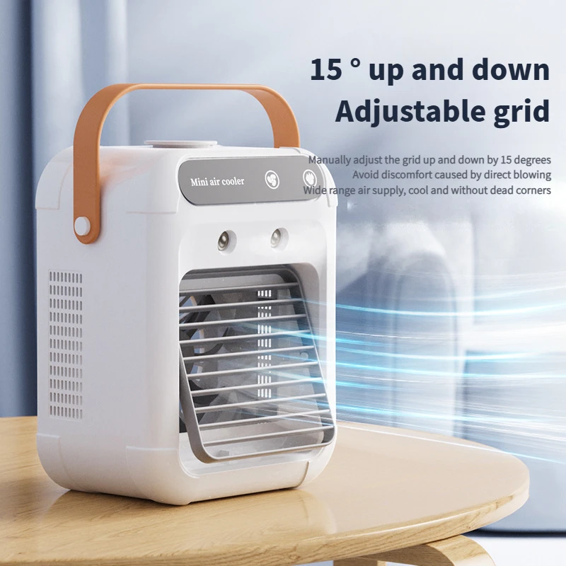 New USB small desktop air cooler mini electric fan with handle two speed adjustable mute spray cooling humidification fan.