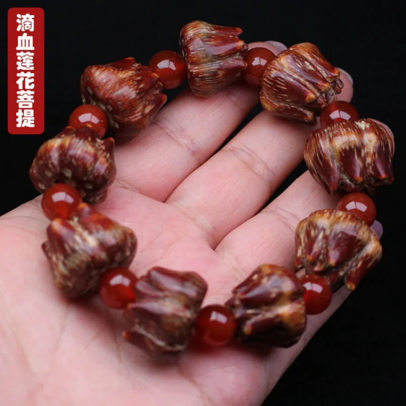 

Factory Supply Blood Dropping Lotus Bodhi Bracelet Hainan Screw Pine Carved Red Blood Lotus Bracelet