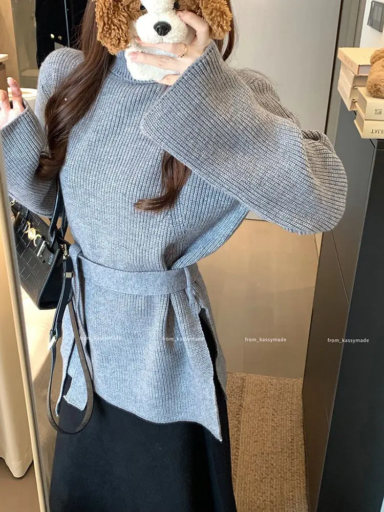 سترة نسائية محبوكة أنيقة جديدة للخريف والشتاء مع خصر دافئ وسترة سميكة ذات ياقة عالية وأكمام طويلة