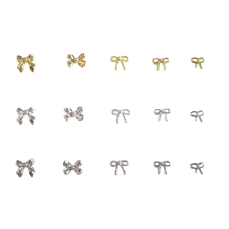 10 ピース/ロットかわいいゴールドシルバー弓ネイルチャーム合金日本ちょう結びリボン金属アクセサリーネイルアートの装飾