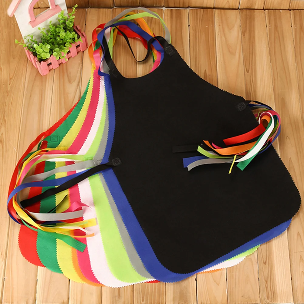 

20pcs Disposable Non-woven Apron Working Cooking Aprons Sleeveless Clothes Protective Gown (Black) non-woven fabric apron