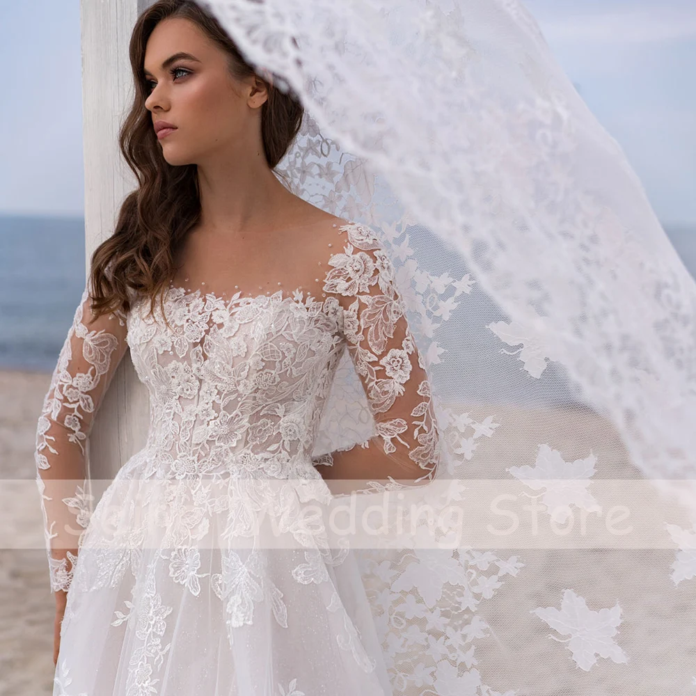 Abiti da sposa Boho 2022 o-collo maniche lunghe abiti da sposa in pizzo A-Line perline Sweep Train boemia abito da sposa Robe De Mariee