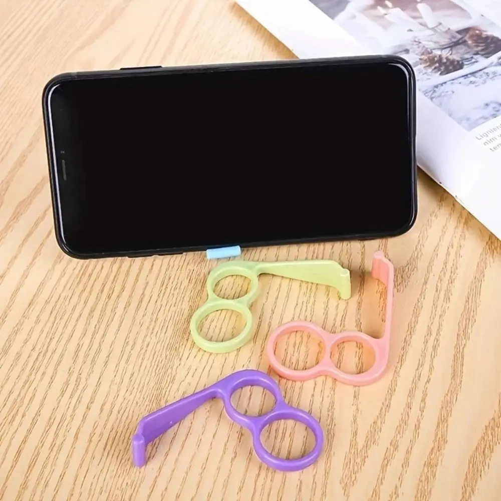 

5Pcs/Set Plastic Mobile Phone Grip Non-slip Universal Finger Ring Holder Random Color Phone Stand for iPhone/ Xiaomi /Samsung