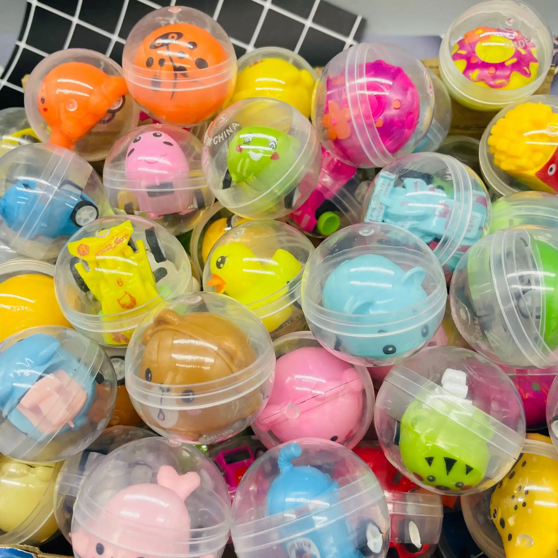 45mm diameter transparent plastic ball capsules toy with inside mini small dolls toys for vending machine